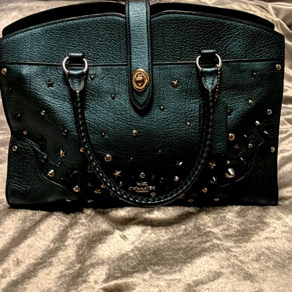 Metallic blue star and rivets coach satchel